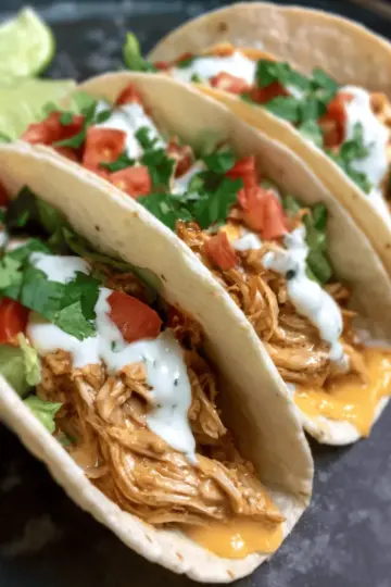 Slow Cooker Queso Chicken Tacos