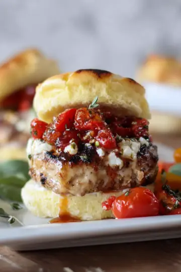 Cheesy Bruschetta Chicken Burgers.