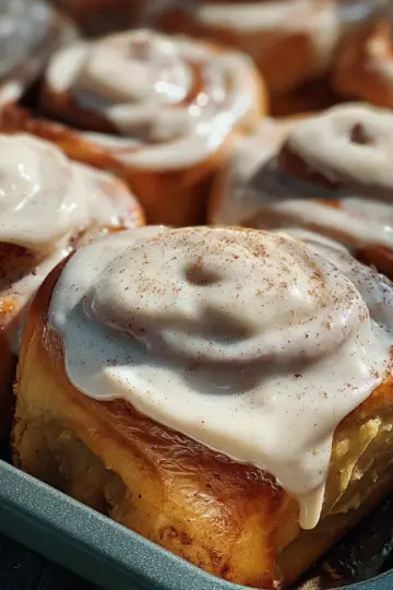 Banana Bread Cinnamon Rolls with Maple Cinnamon Cream Cheese Frosting